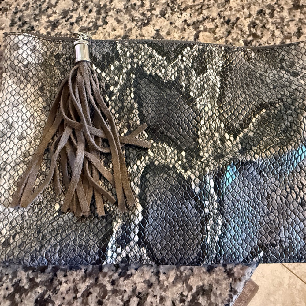 Express Metallic Snake-Embossed Clutch with Brown Tassel Accent